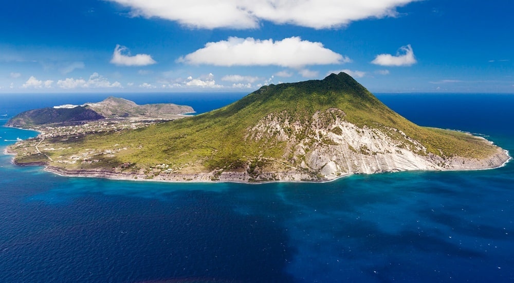 Aerial view of St. Eustatius and the forested peak of The Quill